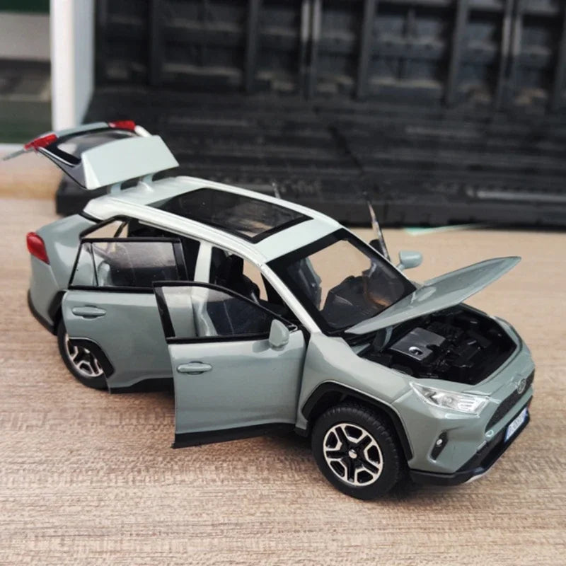 1:32 Toyota RAV4 SUV Alloy Car Model Diecast Metal Vehicles Car Model High Simulation Sound Light Collection Childrens Toy Gift