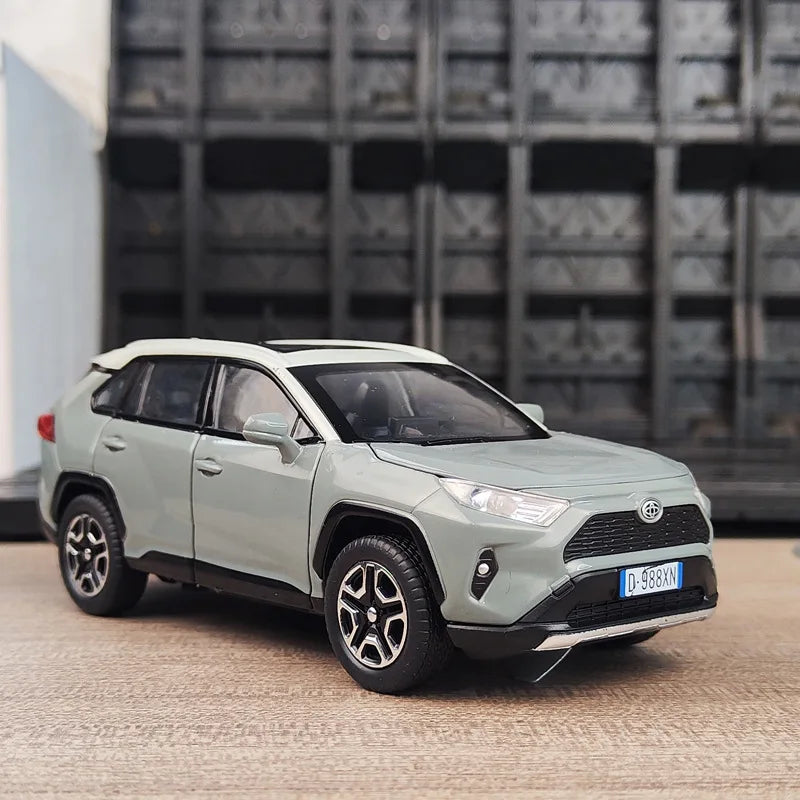 New 1:32 Toyota RAV4 SUV 2023 Alloy Die Cast Toy Car Model Sound and Light Pull Back Children's Toy Collectibles Birthday Gft